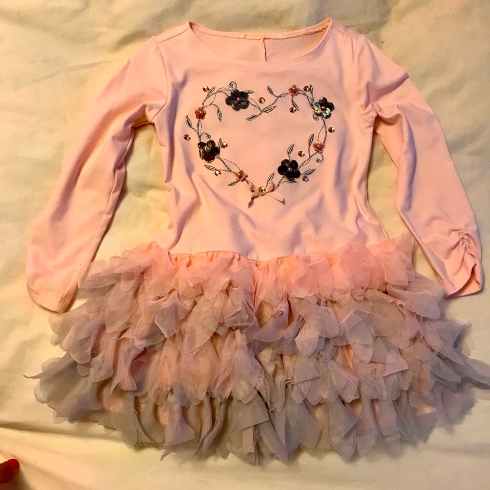 Girl’s adorable ruffled dress